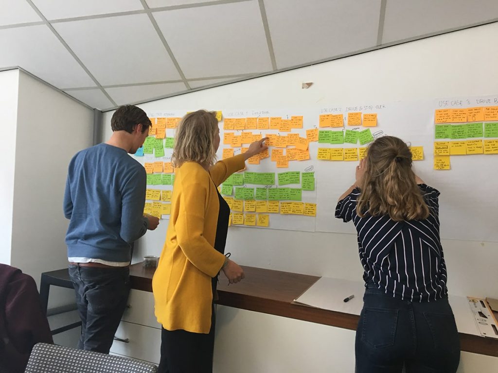 Test facilitator observing Ridecloud usability session